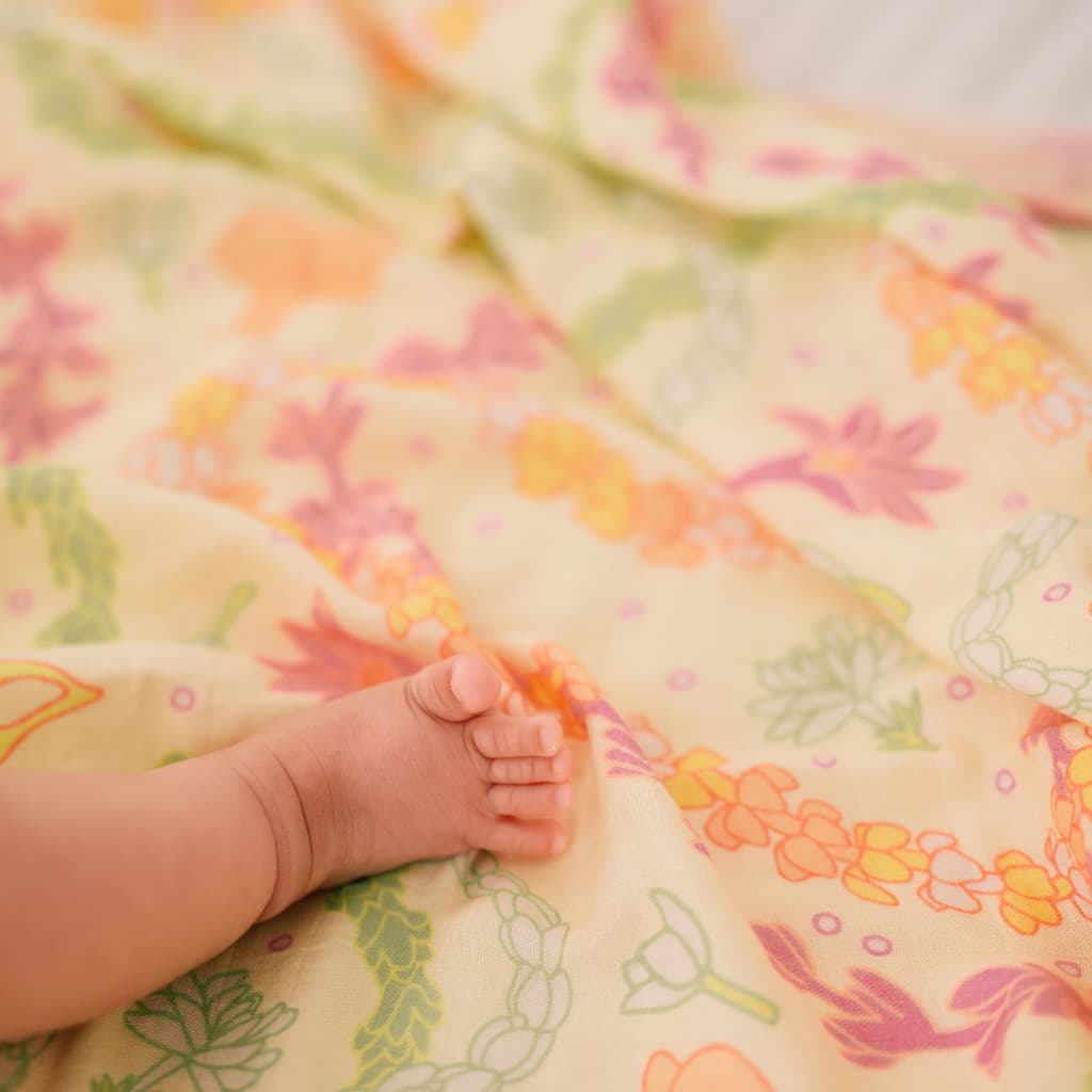 Lei Day in Sand Muslin Baby Swaddle Blanket
