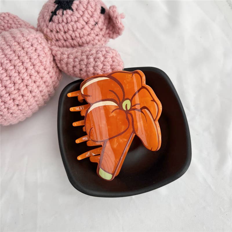 Puakenikeni Claw Clip: Orange
