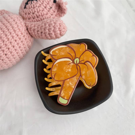Puakenikeni Claw Clip: Yellow